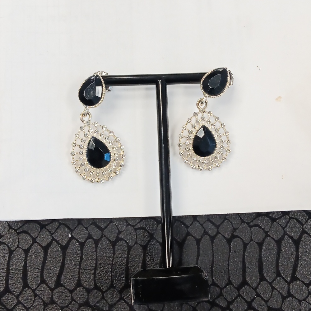 Black studded earrings with rhymes sensual